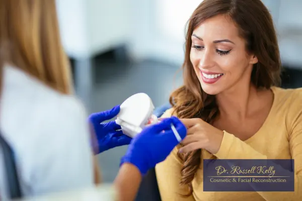 Smiling patient in Orange, CA enjoying gentle laser dentistry care with Dr. Russell Kelly, DDS